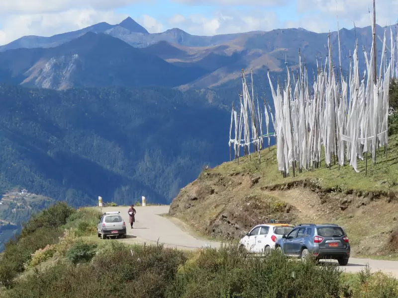 White prayer flags on the ridge at Chele La, above the road between Paro and Haa