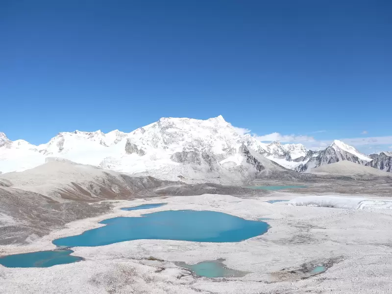 Gangkhar Puensum, the highest mountain in Bhutan, above turquoise glacial lakes