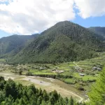 The Haa valley, with its river, fields and houses, seen from the road up to Chele La