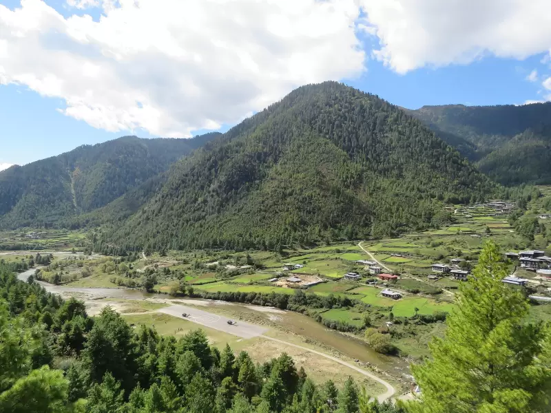 The Haa valley, with its river, fields and houses, seen from the road up to Chele La