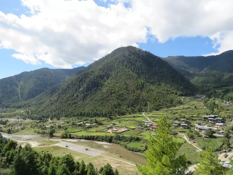 Fields and farmhouses beside the river in the Haa valley
