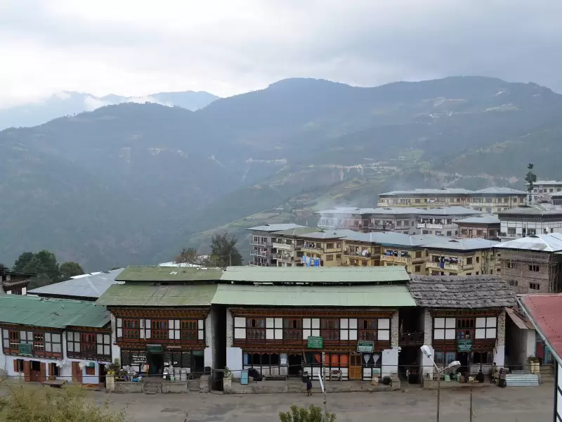 Mongar town on its hillside, with traditional shop-houses in the foreground