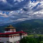 Rinpung Dzong and the Paro valley under a dramatic evening sky