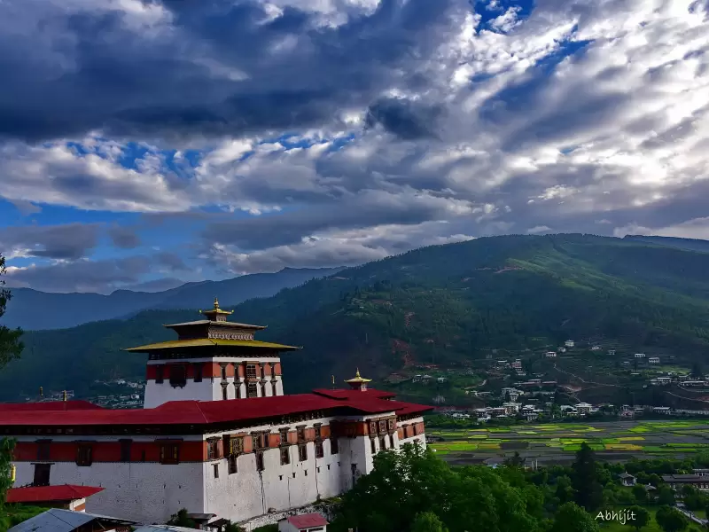 Rinpung Dzong and the Paro valley under a dramatic evening sky