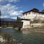 Rinpung Dzong above the Paro Chhu, with the covered wooden bridge that leads to it
