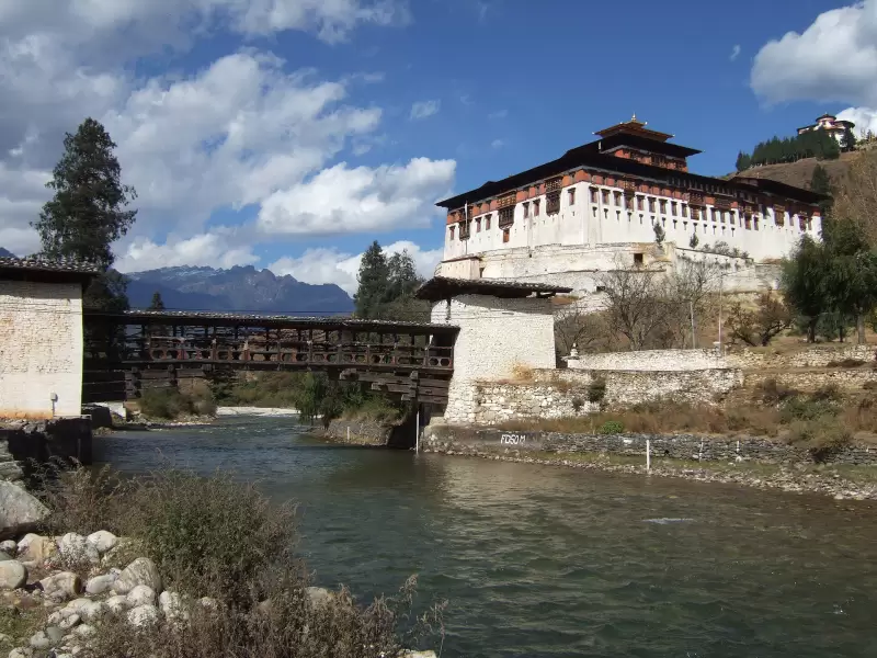 Rinpung Dzong above the Paro Chhu, with the covered wooden bridge that leads to it
