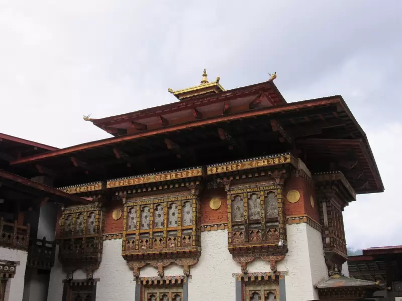 The central tower of Punakha Dzong rising above its courtyard